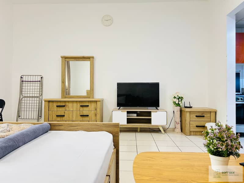 Close to Dragon mart | Spacious Studio | New and Clean