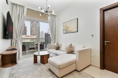 2 Bedroom Flat for Rent in Business Bay, Dubai - Living Room. jpeg