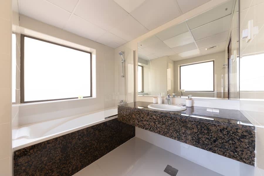 Hot Offer Seaside Serenity: Luxe Two-Bedroom Dubai Retreat with Ferris Wheel Views