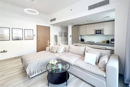 1 Bedroom Flat for Sale in Jumeirah Village Circle (JVC), Dubai - Spacious layout | High ROI | Semi-furnished