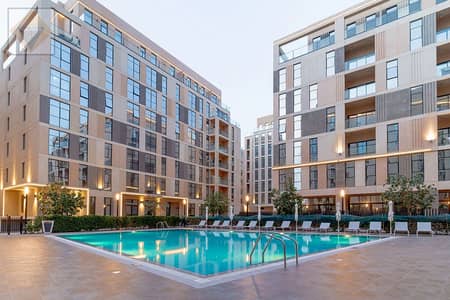 姆瓦伊莱社区， 夏尔迦 1 卧室公寓待售 - Al-Mamsha-Souks-Pool-View. jpg