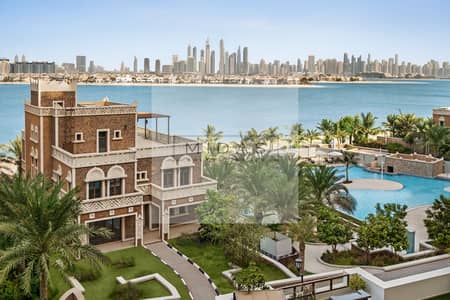 شقة فندقية 2 غرفة نوم للايجار في نخلة جميرا، دبي - 10 Dubai Skyline and Pool View. jpg