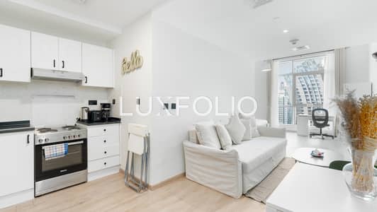 Studio for Sale in Business Bay, Dubai - Upgraded | Canal & Burj Views | Furnished