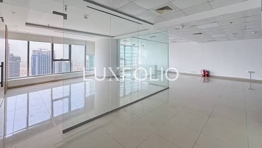 Office for Rent in Jumeirah Lake Towers (JLT), Dubai - Premium Tower | High Floor | New Fitout