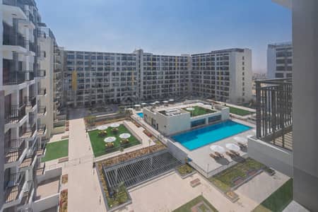Studio for Rent in Town Square, Dubai - Pool View | Fitted Kitchen | Brand New
