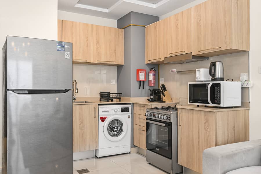 Chic Studio in Downtown | Balcony with a View | Spacious & Fully Equipped - Image 12