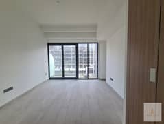 Semi-Furnished Studio I Big Size I Boulevard View I Modern I Mid Floor I Fitted Kitchen I Open View I Peaceful and Amazing Community