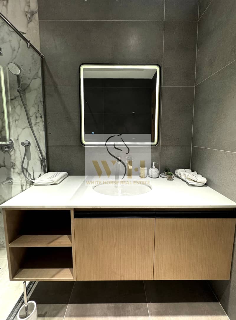 8 Bathroom  Ajman Creek Towers (5). jpg