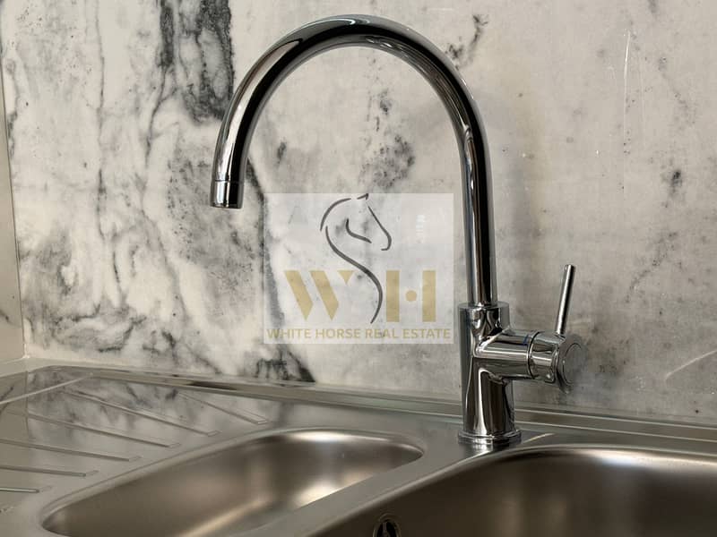 20 Kitchen  Ajman Creek Towers (1). jpg