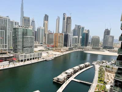1 Bedroom Apartment for Rent in Business Bay, Dubai - Full Canal and Burj Khalifa View | Vacant