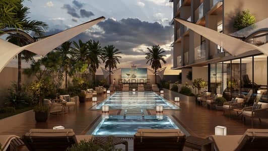 استوديو  للبيع في المدينة العالمية، دبي - VIEW-9-POOL-NIGHT-SCENE-1-scaled. jpg