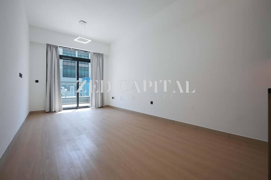 位于朱美拉环形村(JVC)，JVC第10区，瑞格尔公寓 1 卧室的公寓 1050000 AED - 12965101