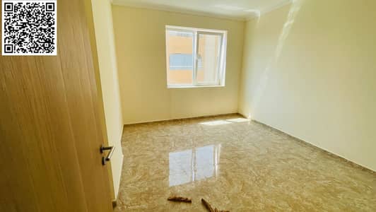 For annual rent, a two-bedroom apartment with a balcony in Al Rashidiya 2, Ajman. The apartment consists of two spacious and comfortable bedrooms, off