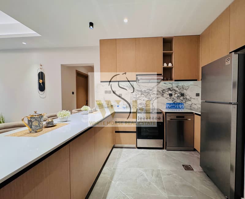22 Kitchen  Ajman Creek Towers (2). jpg