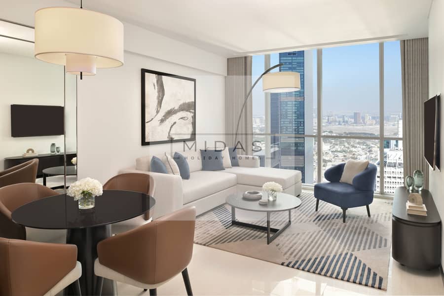 2 One-Bedroom Apartment - Living + Dining. JPG