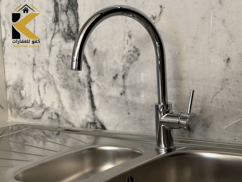 19 Kitchen  Ajman Creek Towers (1). jpg