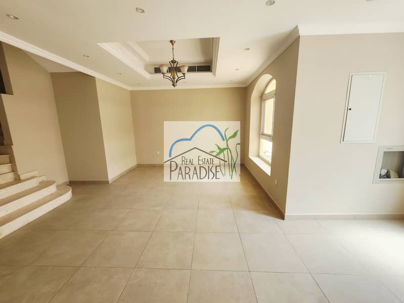 Available modern finish new 4 bedroom 2 master bedrooms villa/maids room/store room/laundry space/private back yard covered parking for rent in mirdif