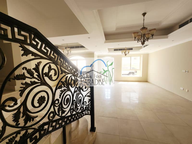 Available modern finish new 4 bedroom 2 master bedrooms villa/maids room/store room/laundry space/private back yard covered parking for rent in mirdif