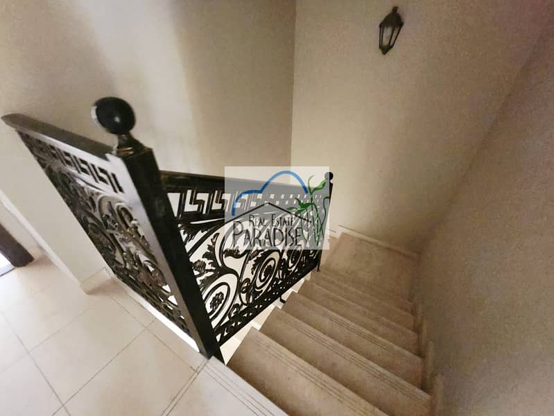 Available modern finish new 4 bedroom 2 master bedrooms villa/maids room/store room/laundry space/private back yard covered parking for rent in mirdif