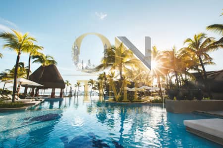 2 Bedroom Flat for Sale in Ajman Free Zone, Ajman - swimming-pool-among-palm-trees-on-a-tropical-islan-2022-02-12-05-47-40-utc. jpg