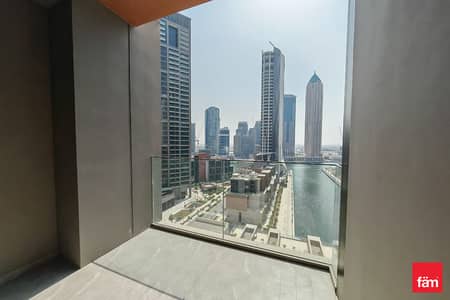 1 Bedroom Apartment for Rent in Business Bay, Dubai - Brand New | Full Canal & pool View | Furnished
