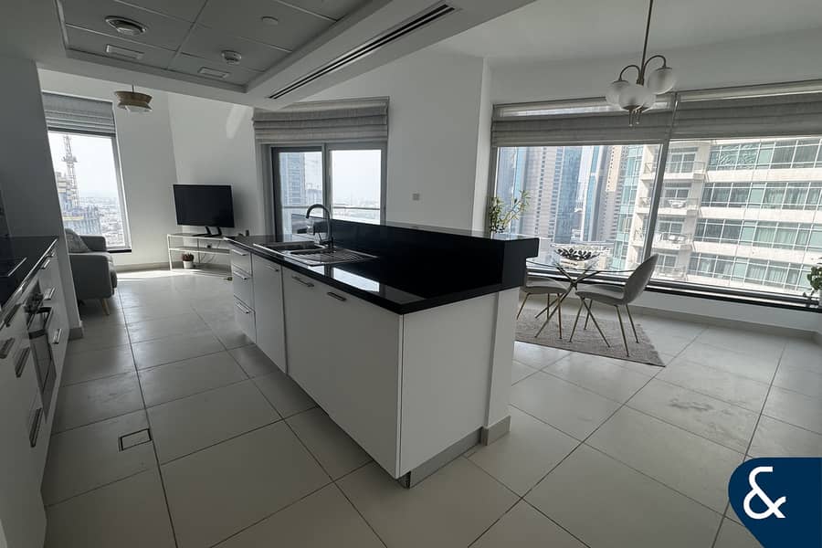 Stylish 1BR | Prime Location | City Views