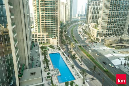 2 Bedroom Flat for Sale in Downtown Dubai, Dubai - Vacant 2br low floor unit with blvd and pool view