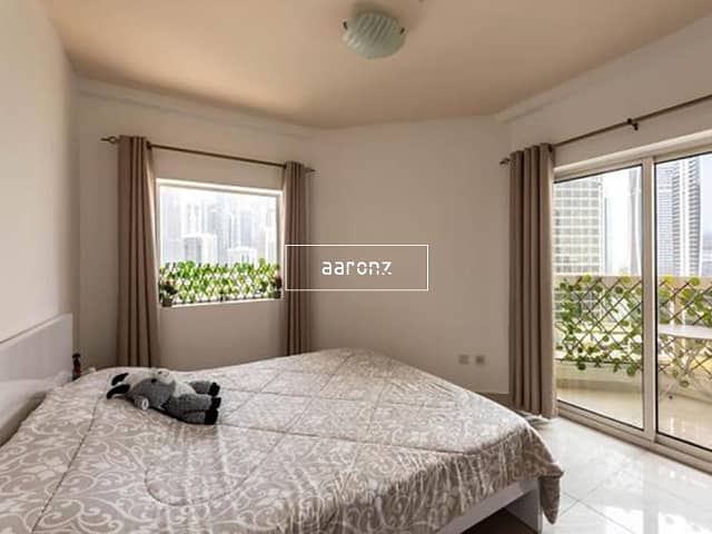 位于朱美拉湖塔 (JLT)，JLT Q区，新迪拜门1号 1 卧室的公寓 859000 AED - 13010577