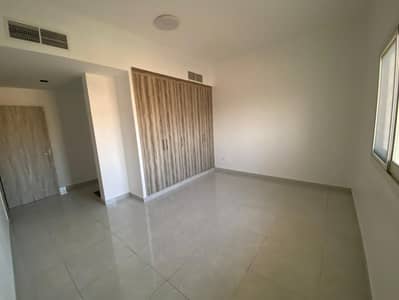 A room and a hall for annual rent in Ajman, Al Jurf area, a new building, the first resident with a balcony, the first resident, close to Mohammed bin