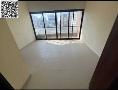 Two-bedroom apartment for annual rent in Al Hamidiya, Ajman, in a prime location close to Ajman Court and Nesto, with a fully equipped kitchen, centra