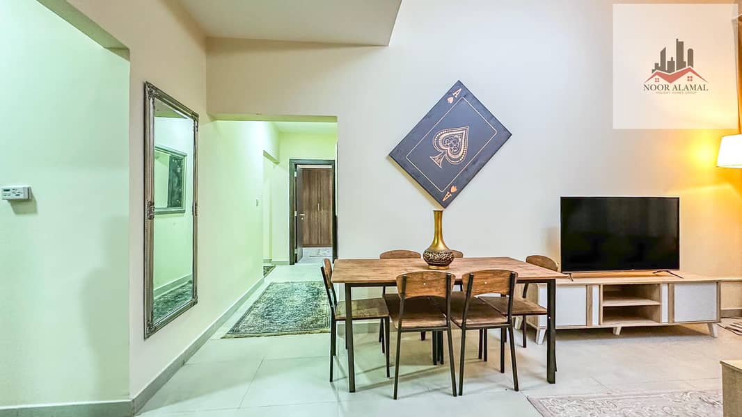 Dubai, Mirdif, opposite Mirdif City Centre, 3 bedrooms, hall, 4 bathrooms, first tenant, fully furnished with hotel furniture, large balcony, and park - Image 9