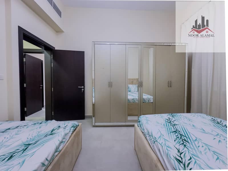 Dubai, Mirdif, opposite Mirdif City Centre, 3 bedrooms, hall, 4 bathrooms, first tenant, fully furnished with hotel furniture, large balcony, and park - Image 16