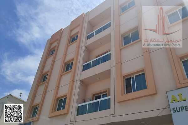 For annual rent in Ajman, two bedrooms, a hall, three bathrooms, and a balcony in Al Tanaiji 2 Building. Required: 35,000 installments.