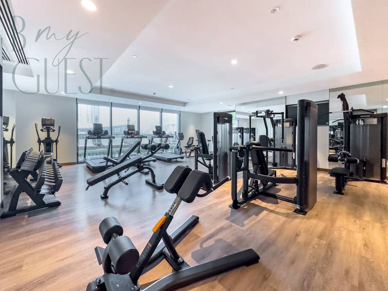 Stately 2BR Living in The ACT Tower Downtown Dubai - Image 25