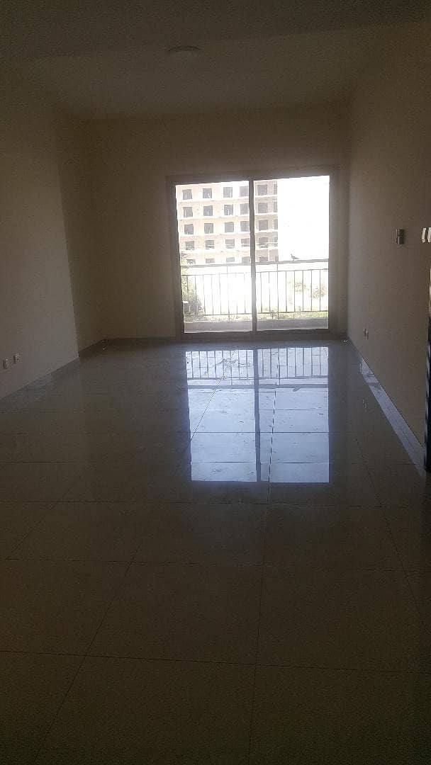 Jvc , 1 b/r with 4 cheques , low floor , living room , balcony , road view