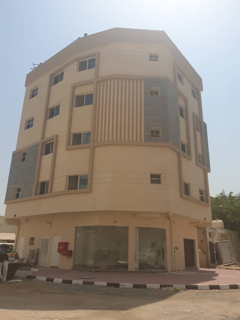 A new building for sale in Al Bustan area, the second piece of the street behind Al-Surour Bakery and opposite the city police station