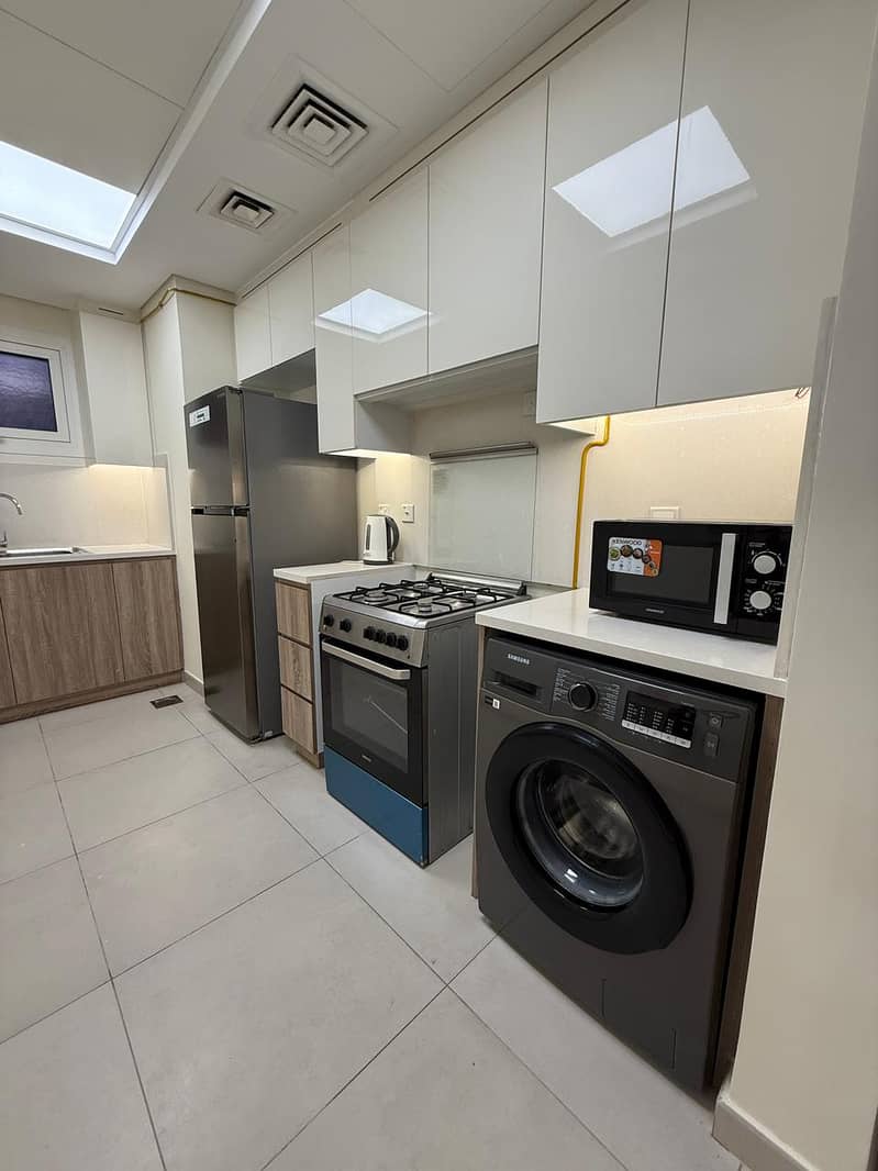 1BR FULLY FURNISHED APARTMENT WITH MAID'S ROOM AND OPEN TERRACE - Image 10