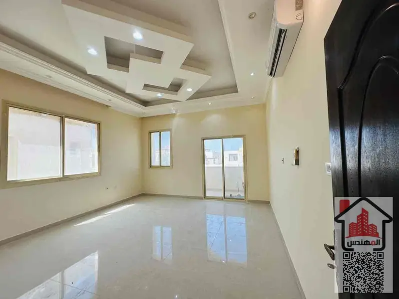 Villa for rent in Al Muwaihat 1 on the street Second occupant Area 5,000 sq ft Consisting of 5 master bedrooms, a living room, 2 halls, 2 kitchens, a maid's room, a storeroom, a spacious courtyard, a parking space, and a large setback in front of the vill - View 4