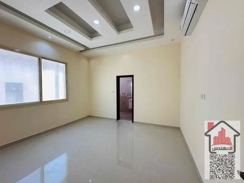 Villa for rent in Al Muwaihat 1 on the street Second occupant Area 5,000 sq ft Consisting of 5 master bedrooms, a living room, 2 halls, 2 kitchens, a maid's room, a storeroom, a spacious courtyard, a parking space, and a large setback in front of the vill - View 5