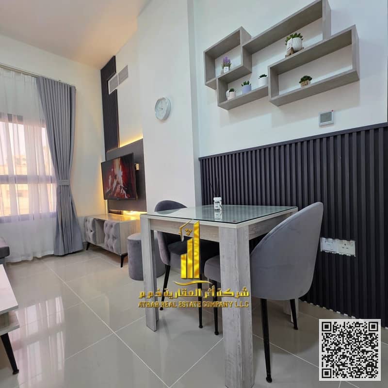 Luxury apartment for monthly rent, one bedroom and a hall with an open view, fully furnished with elegant furniture and a fully equipped kitchen
