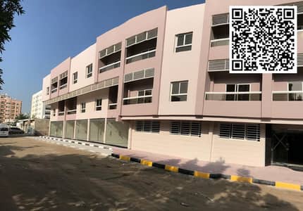 Invest in a fully leased residential and commercial building in Al ...