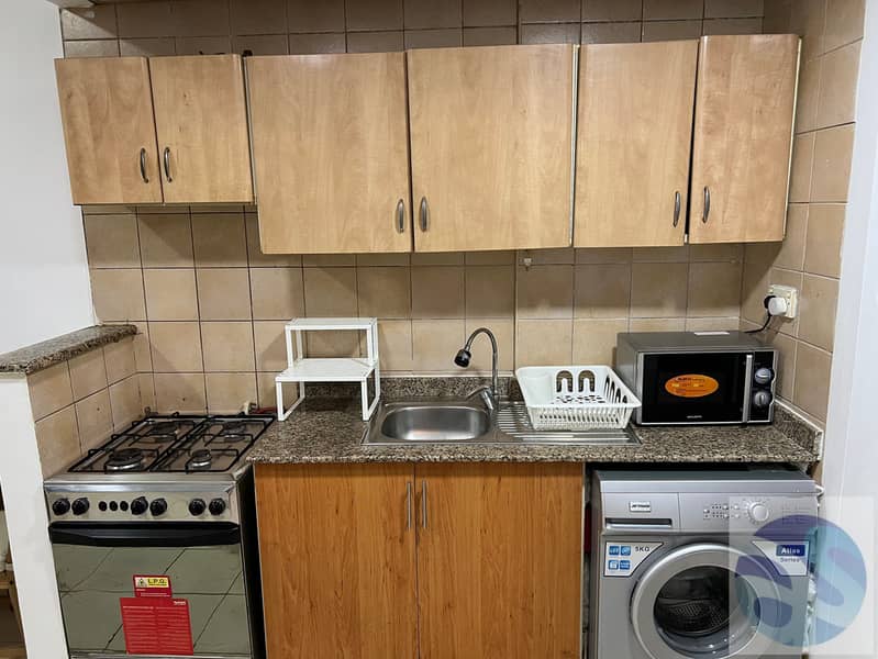 Fully Furnished Studio Monthly in England Cluster International City - Image 15