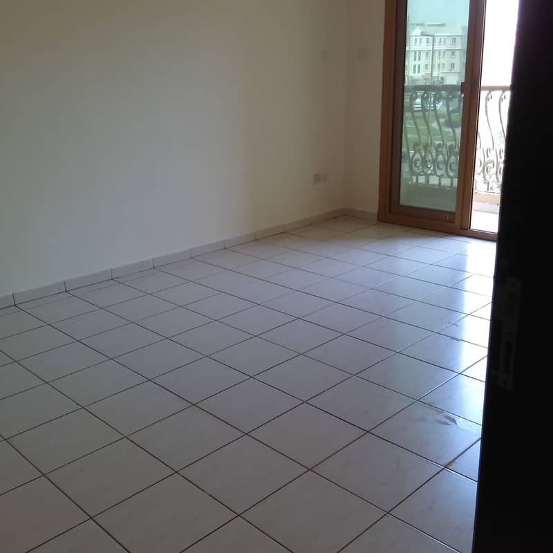 1 BR flar in Spain cluster with balcony for rent AED 30k