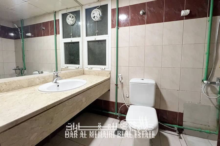 Spacious 1-Bedroom Flat Near Sharaf DG Metro | Sharing Allowed | Golden Sand Area - Image 12