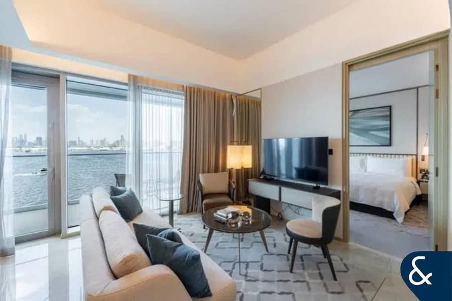 One Bedroom | Burj + Sea View | Furnished - Image 6