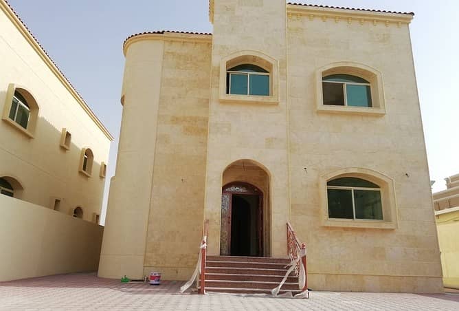 Villa  very close to Sheikh Mohammed Bin Zayed Road and Dubai Airport .