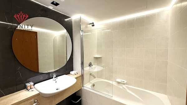 Quick Move-In | Elegant 3BHK Premium Furnished | Complete SZR View | Sheikh Zayed Road | Near Metro | Access to Dubai Mall & WTC - Image 10