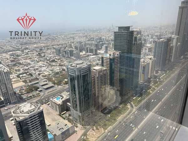 Quick Move-In | Elegant 3BHK Premium Furnished | Complete SZR View | Sheikh Zayed Road | Near Metro | Access to Dubai Mall & WTC - Image 16