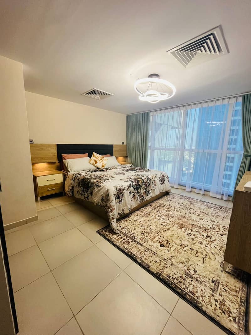 Spacious Apartment in Arch Tower JLT | Close to Metro | Stunning Lake View - Image 18