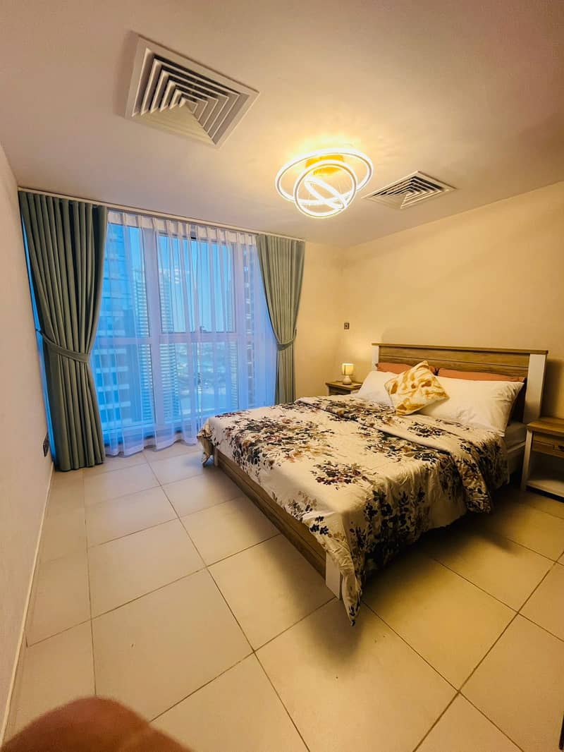 Spacious Apartment in Arch Tower JLT | Close to Metro | Stunning Lake View - Image 25